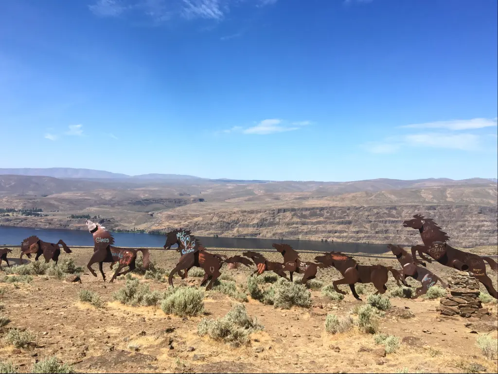 An image with several wild horses sculpted by David Govedare in Vantage, Washington.
