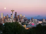 Seattle skyline at dusk with Mt Rainier in the background