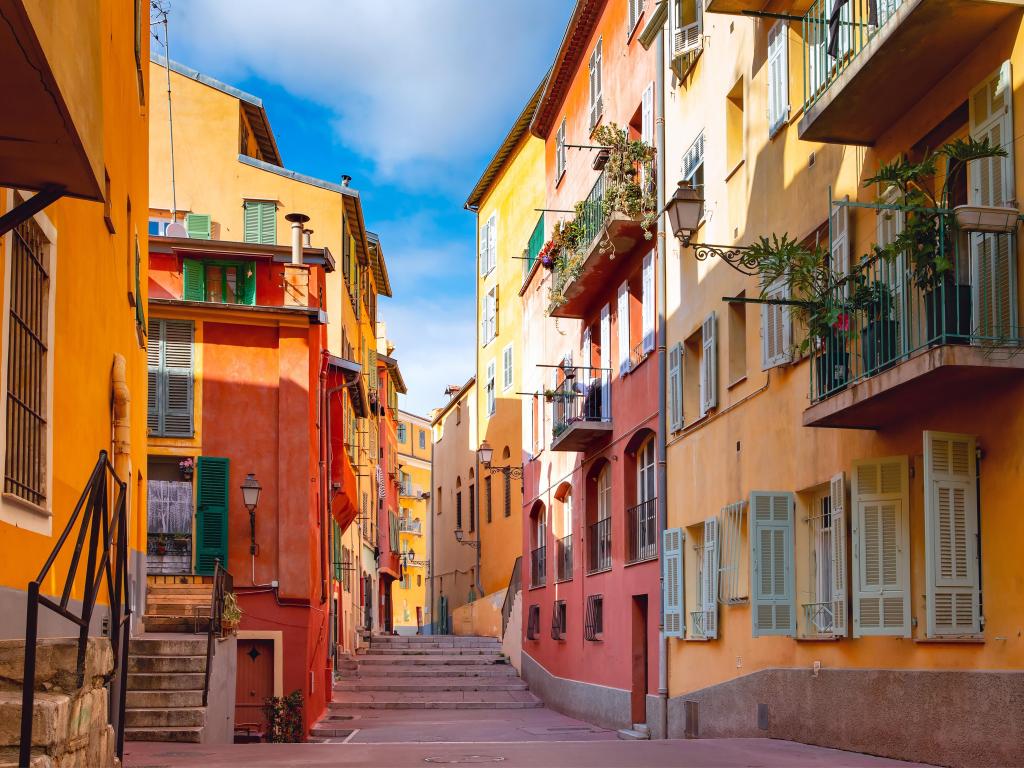 Sunny colorful historical houses in Old Town of Nice, French Riviera, Cote d'Azur, France