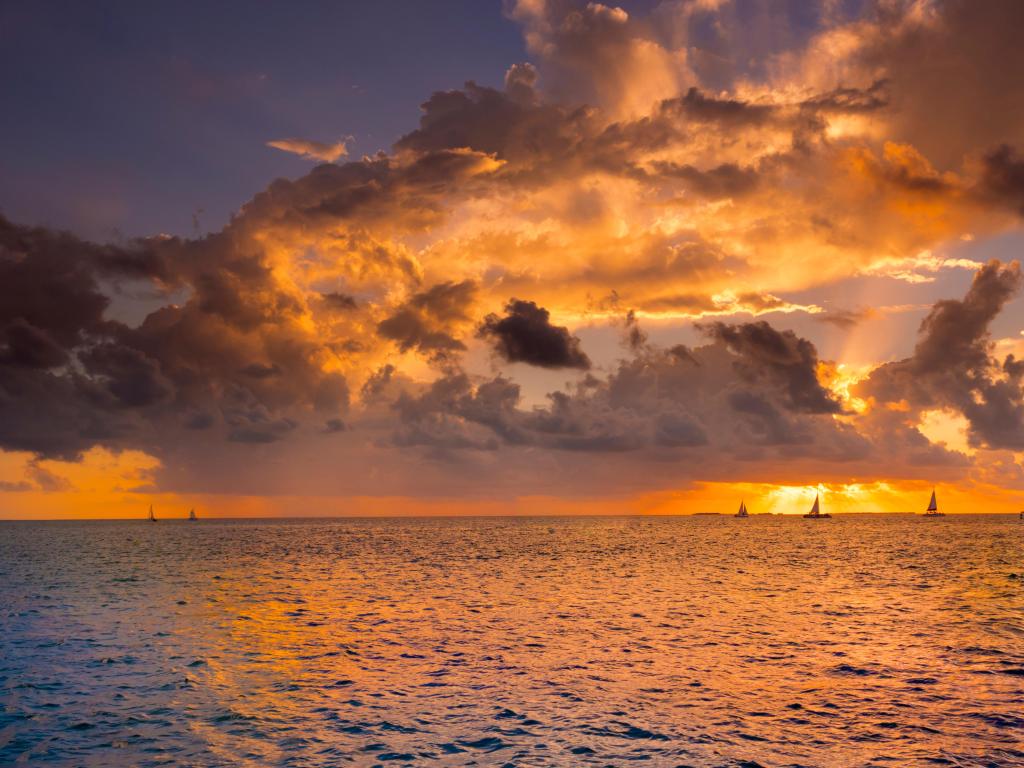 Mallory Square, Key West, Florida with a dramatic sunset capturing a sunset sail.