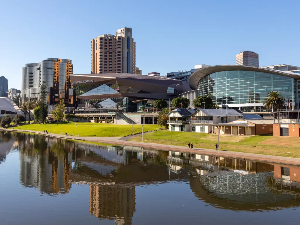 Adelaide cityscape reflecting in the River Torrens on a sunny day
