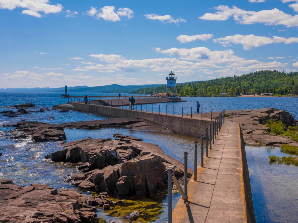 Grand Marais Light against the backdrop of the Sawtooth Mountains on Lake Superior. Grand Marais, Minnesota.