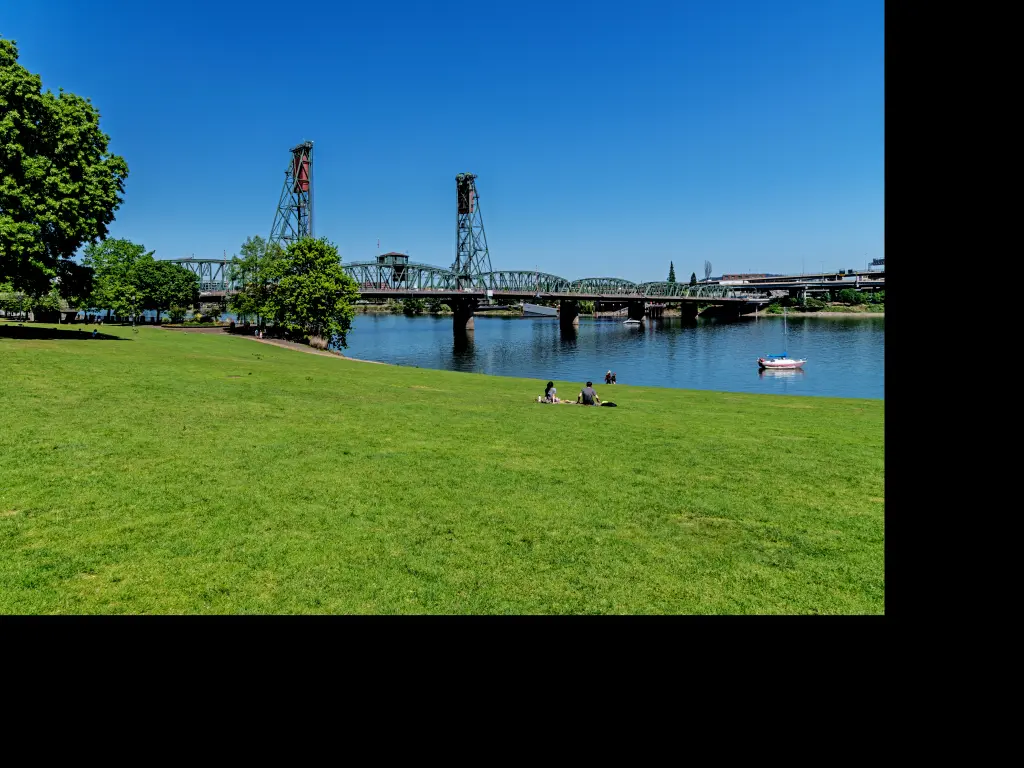 Tom McCall Waterfront Park and the Hawthorne Bridge on the Willamette River in Portland, Oregon
