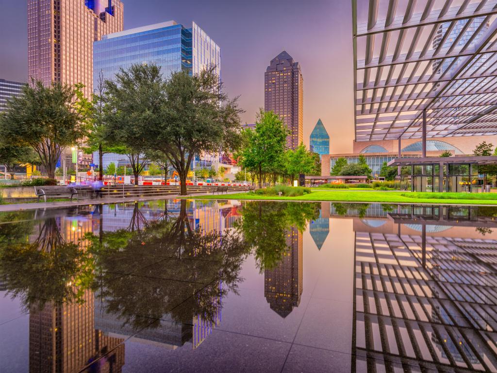 Dallas, Texas, USA downtown plaza and cityscape at twilight.