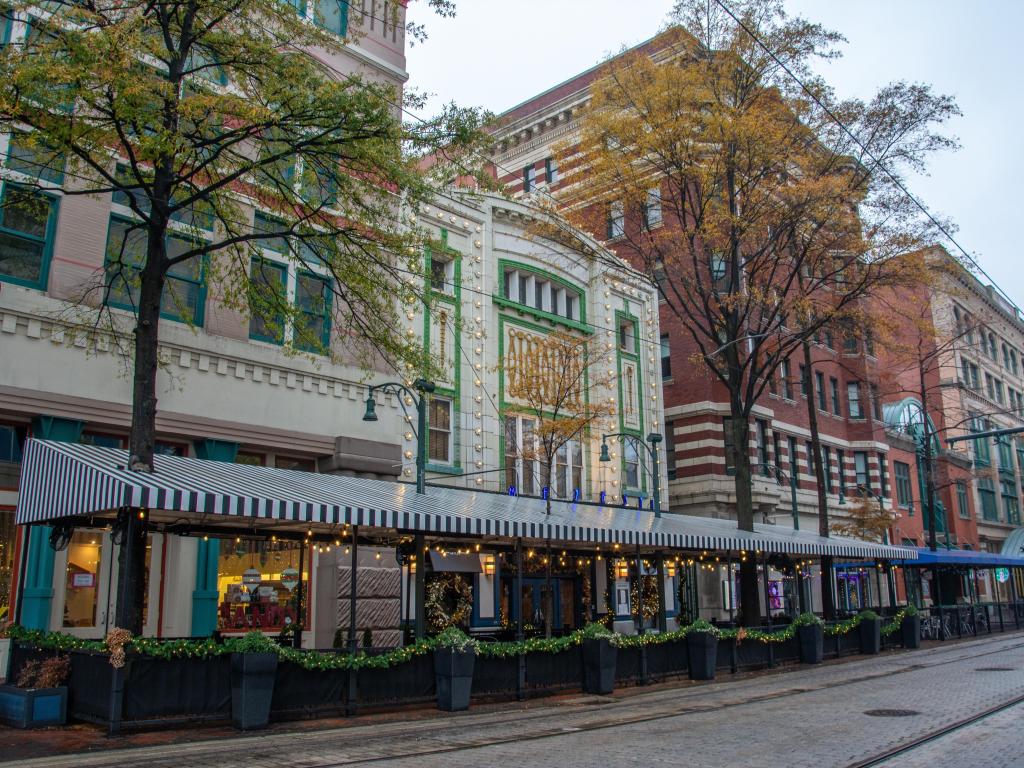 The Memphis Main Street and its stores with Christmas decorations at dusk