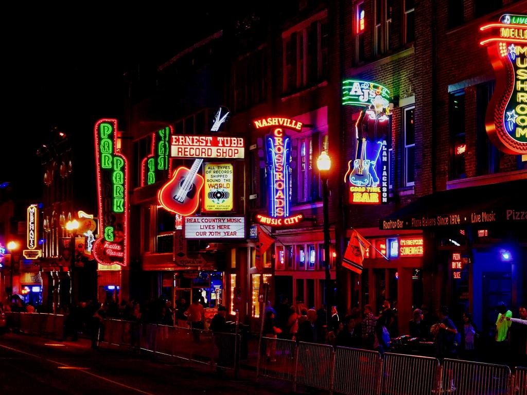 Nashville, Tennessee, USA on Broadway in Nashville at night.