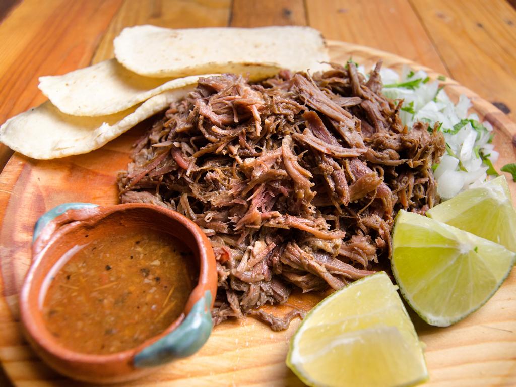 Mexican Barbacoa BBQ style with sauce and bread