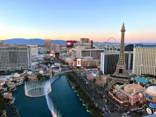 Aerial view of the Strip during dusk with famous hotels and casinos in focus