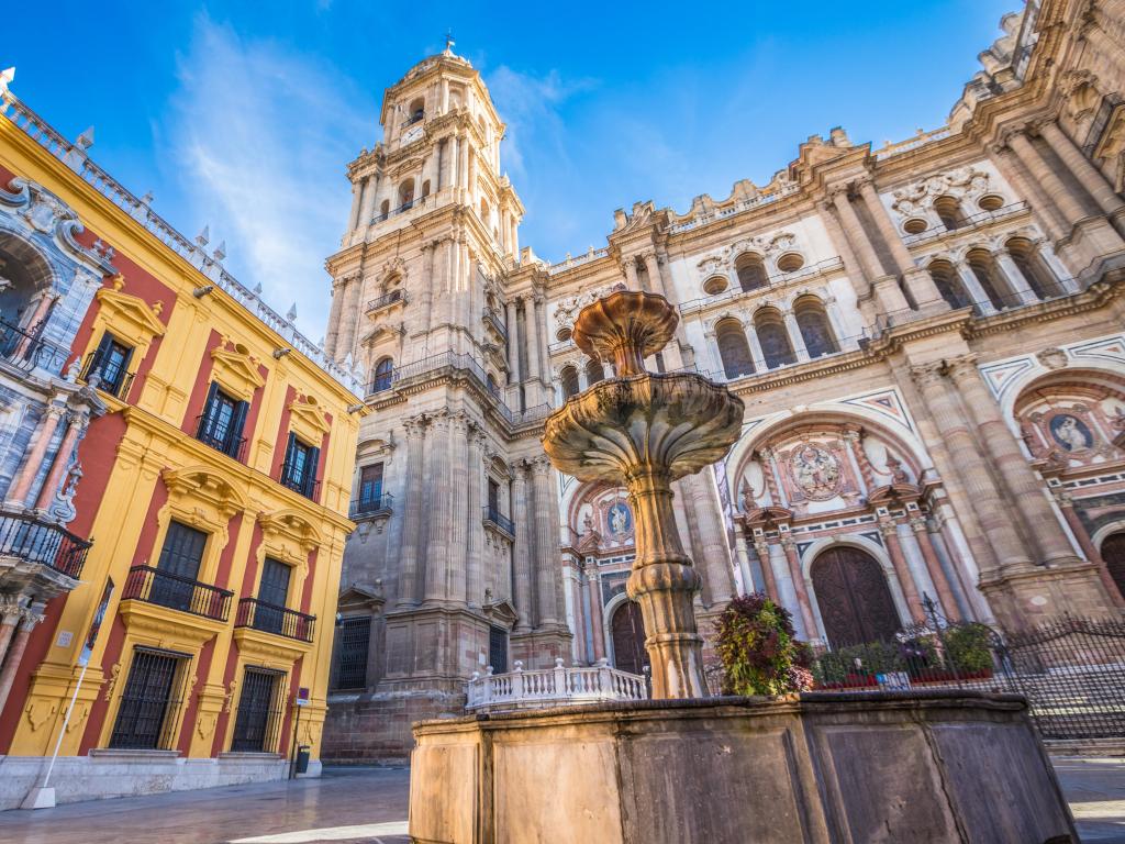 Malaga in Spain on a sunny day with a cathedral in the background