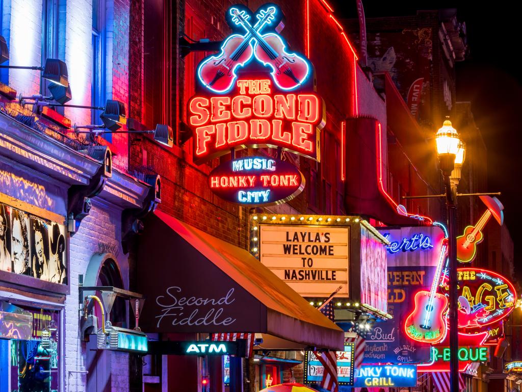 Neon signs outside night clubs and music venues on Lower Broadway in Nashville, Tennessee.