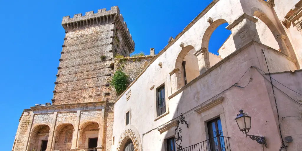 The turret of Ducal Castle, Ceglie Messapica against a blue sky 