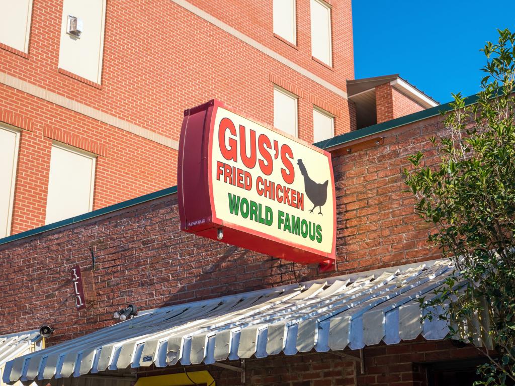 Sign outside Gus's World Famous Fried Chicken first restaurant in Memphis