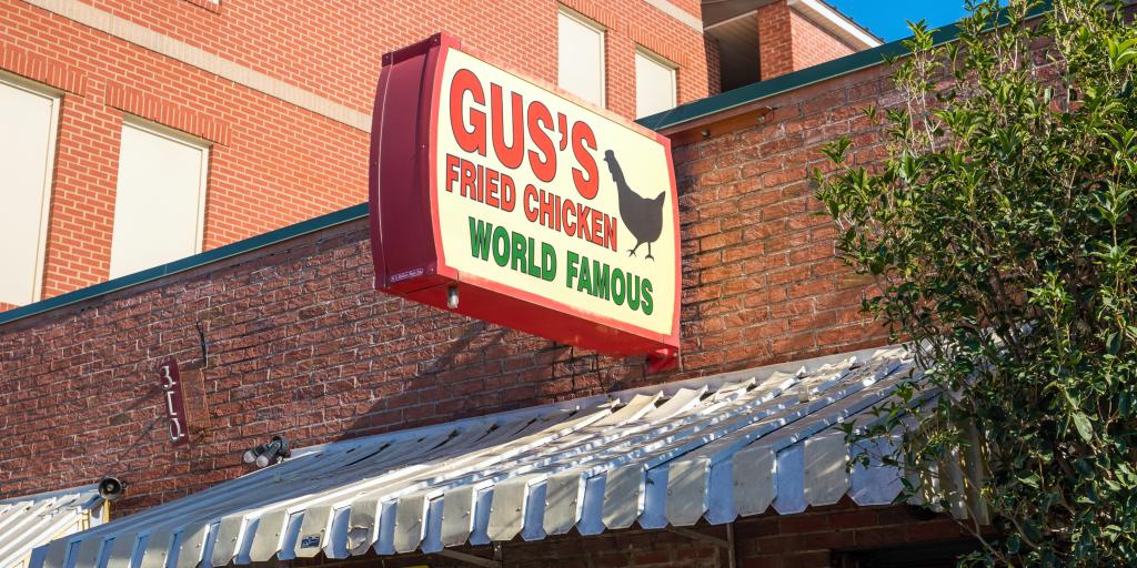 Sign outside Gus's World Famous Fried Chicken first restaurant in Memphis
