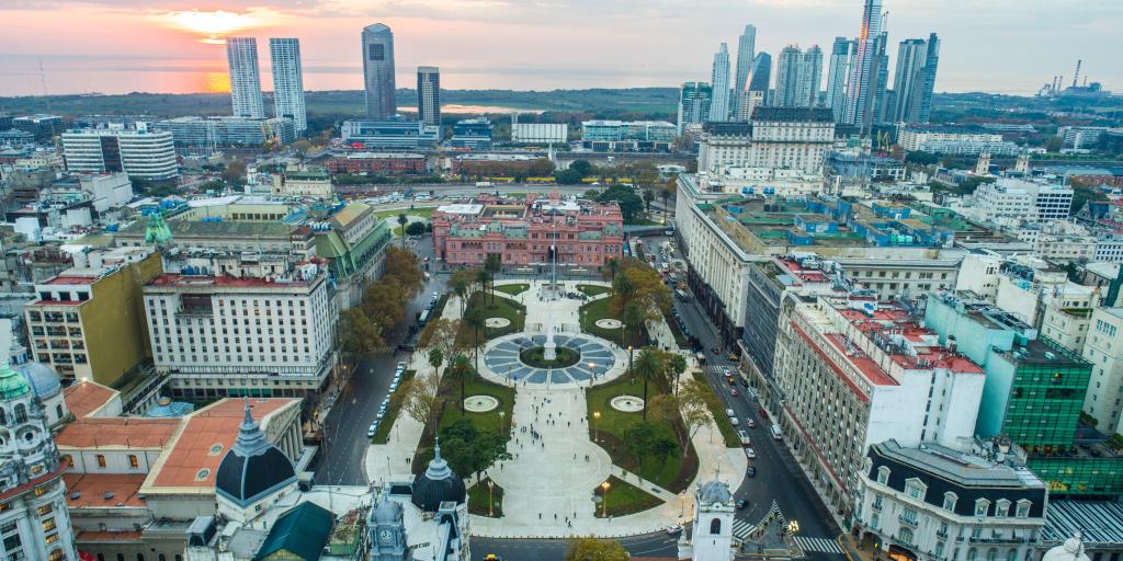  Aerial view of the Plaza de Mayo in Buenos Aires, Argentina, with the paved area and May monument in the middle, and large colonial buildings around the outside of it
