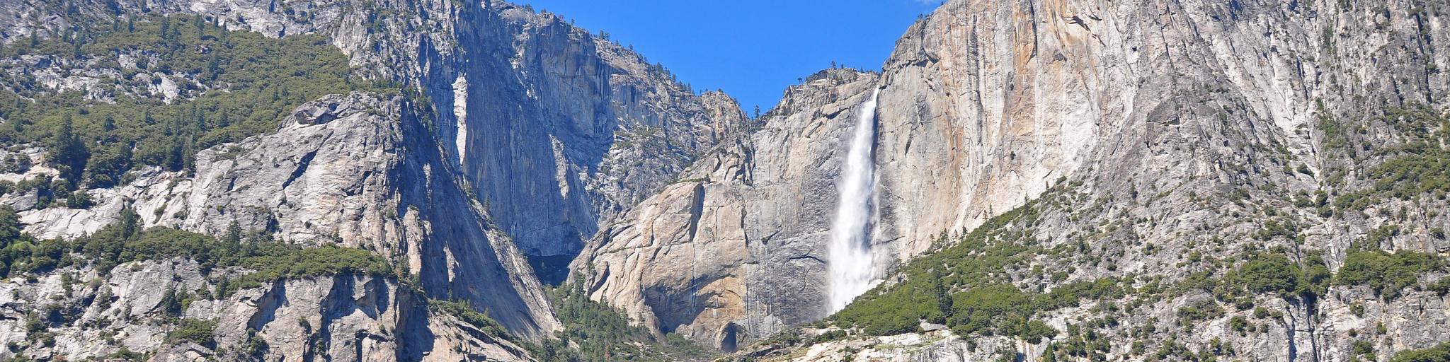 View of gushing Lower and Upper Yosemite Falls from Cook's Meadow Loop