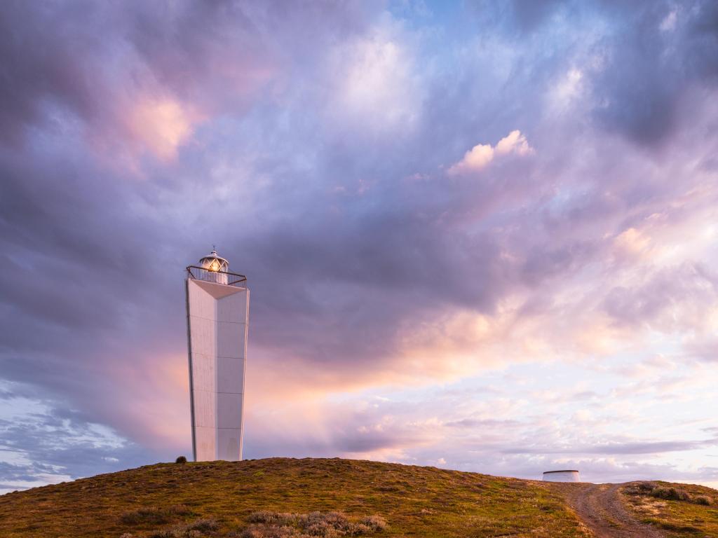 Cape Jervis, South Australia taken at sunset with a view of the modern lighthouse with colourful clouds. 