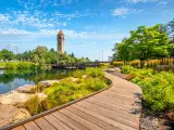 A summer day view of the Great Northern Clock Tower, Expo Pavilion, Spokane River