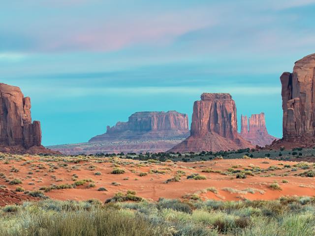 Sunrise at the buttes of Monument Valley on the Arizona - Utah border.