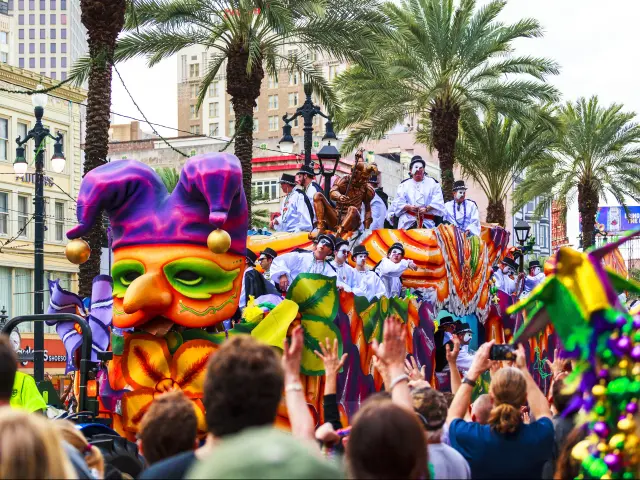 Mardi Gras parades through the streets of New Orleans.People celebrated crazily. Mardi Gras is the biggest celebration the city of New Orleans hosts every year.