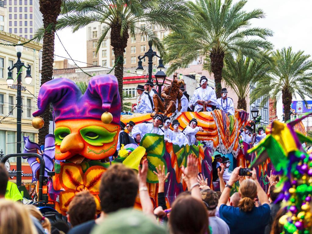 Mardi Gras parades through the streets of New Orleans.People celebrated crazily. Mardi Gras is the biggest celebration the city of New Orleans hosts every year.
