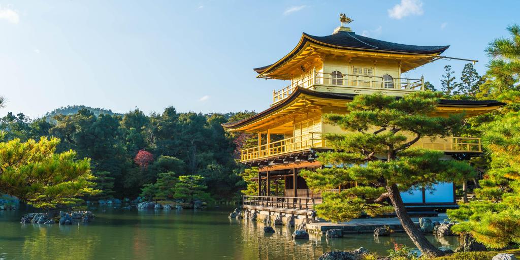 Outside of the Gold Pavilion, Kyoto across a pond with trees