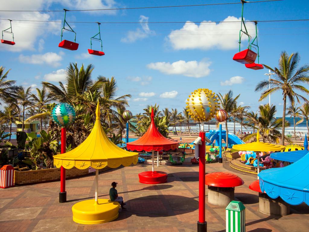 Waterfront of Durban, South Africa, with colorful amusements and rides