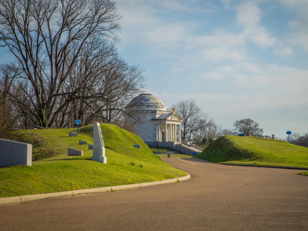 Vicksburg National Military Park, Vicksburg, USA with war memorials surrounded by green grass and taken on a sunny day.