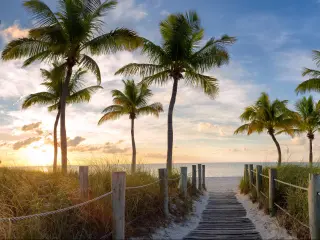 Panorama view of footbridge to the Smathers beach at sunrise - Key West, Florida, USA.