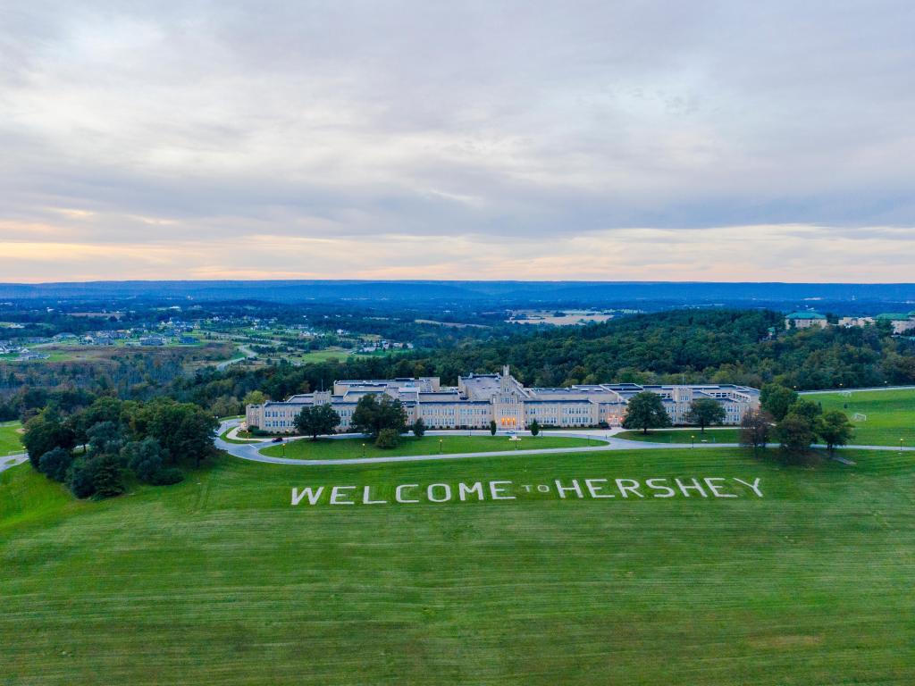 Hershey, Pennsylvania, USA with the 'Welcome to Hershey' sign taken as an aerial view.