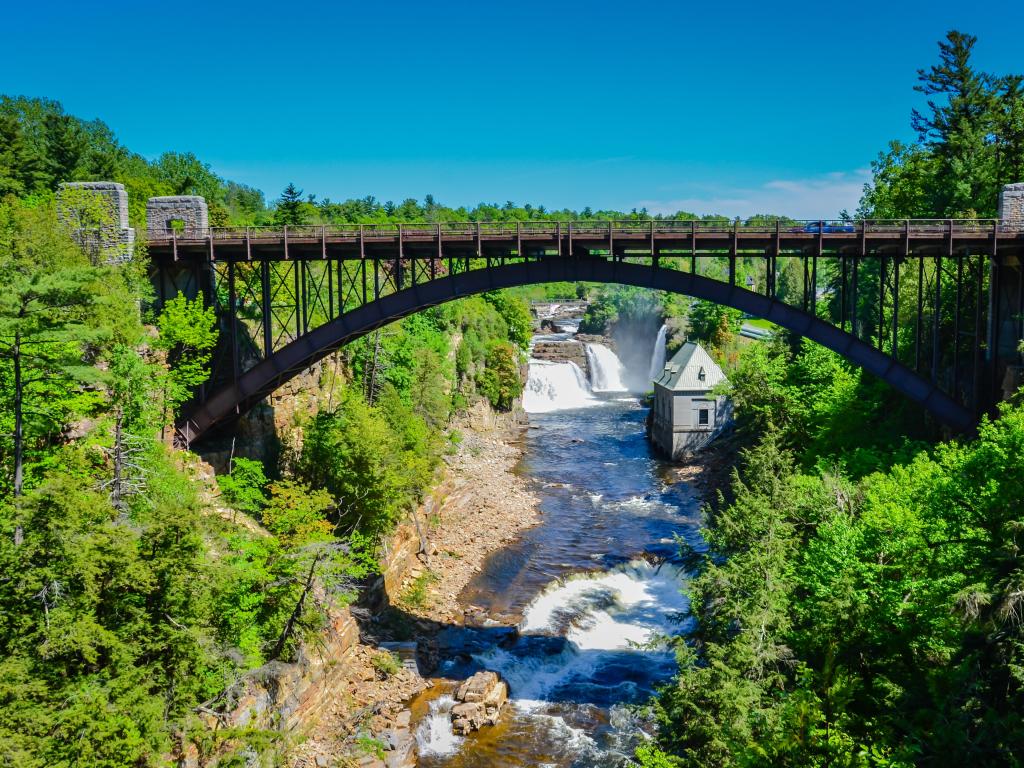 Bridge over Ausable Chasm, Keeseville, New York, USA, a sandstone gorge and tourist attraction located near the hamlet of Keeseville on a sunny day.