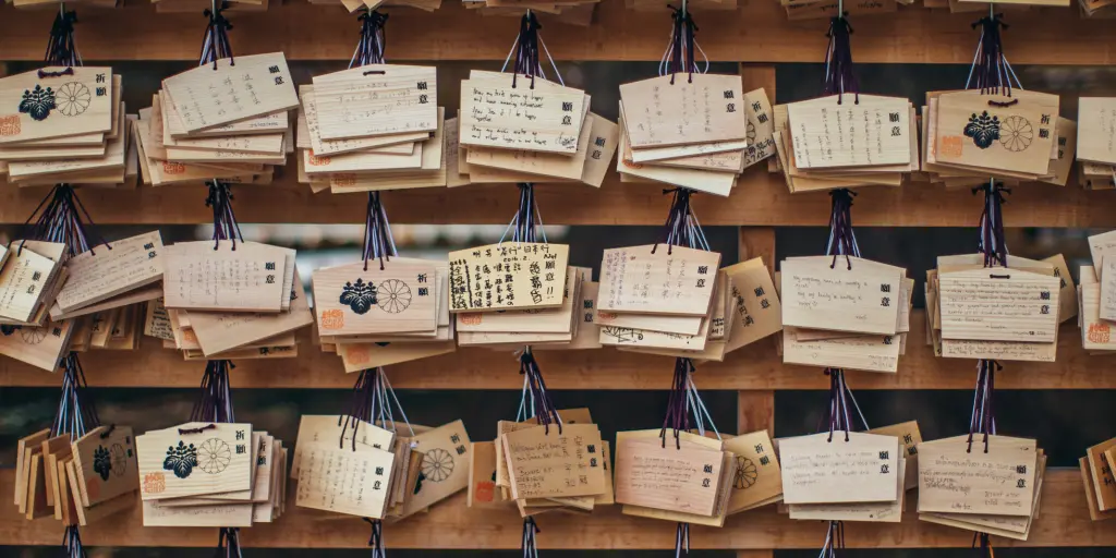 Wishes written on wooden squares (emas) hung at Meiji Shrine, Tokyo 