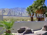 Palm Springs sign with desert background and backdrop of San Jacinto Mountain, California