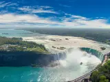 Panorama of aerial view of Canadian side view of Niagara Falls, American Falls and Horseshoe Falls in Niagara Falls, Ontario, Canada