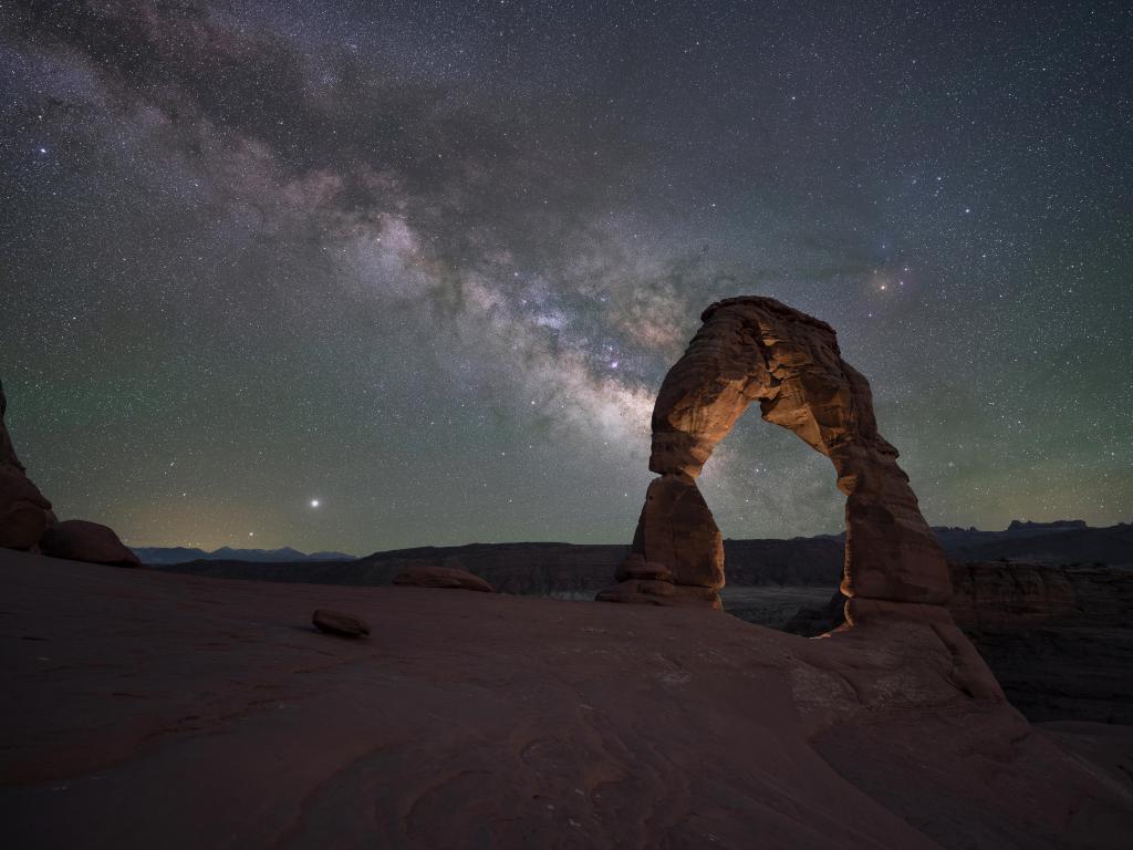 Delicate Arch at night with the Milky Way in the background