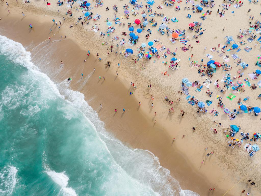Aerial view of beach goers in Asbury Park along the sandy shoreline, New Jersey 