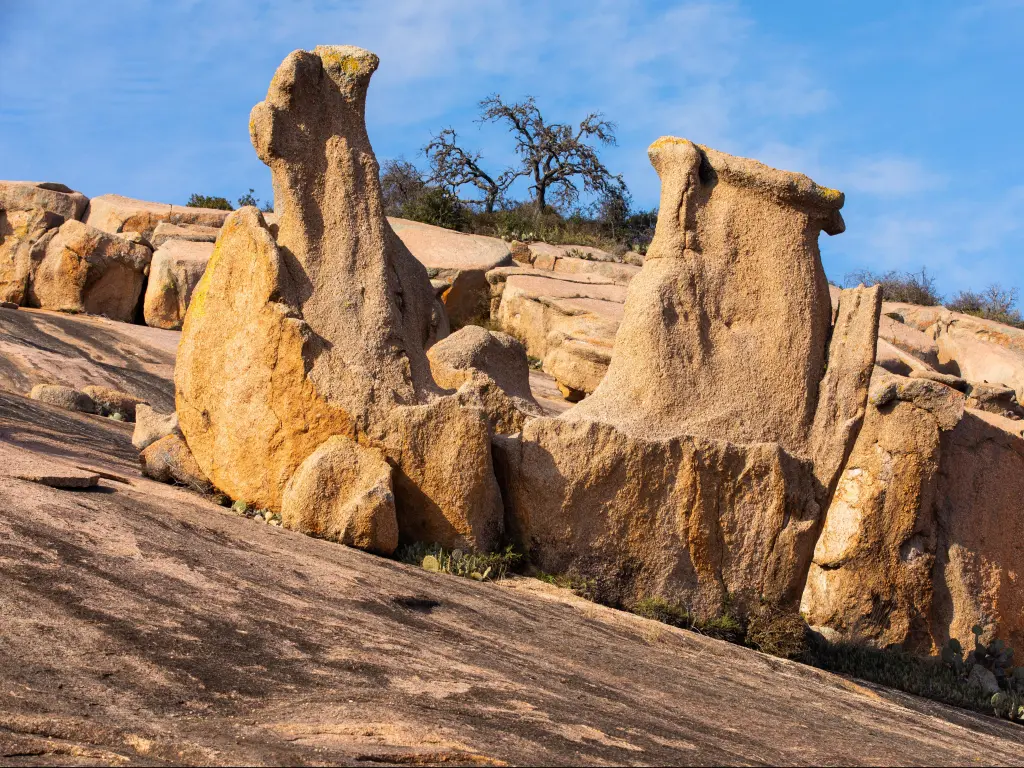 Enchanted Rock State Natural Area, Texas, USA with iconic granite mounds in the foreground.