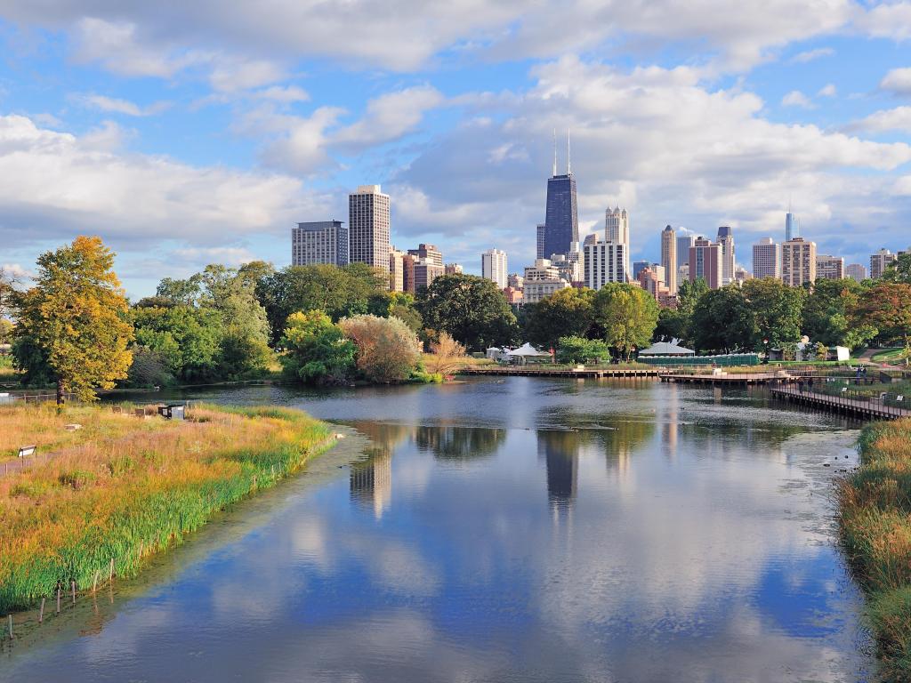 Chicago, USA skyline with skyscrapers viewed from Lincoln Park with the lake in the foreground and taken on a sunny day.