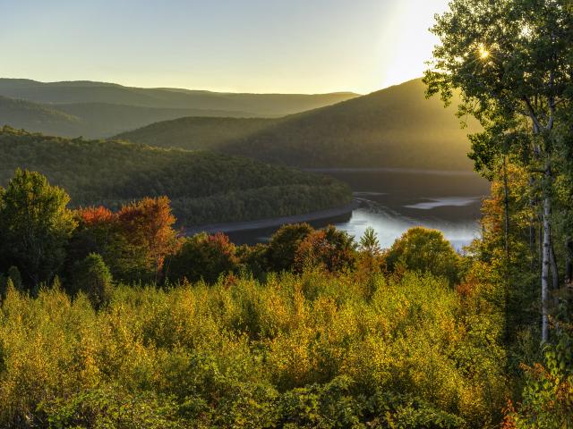 The rolling hills of the Catskills around Pepacton Reservoir at sunset in upstate New York