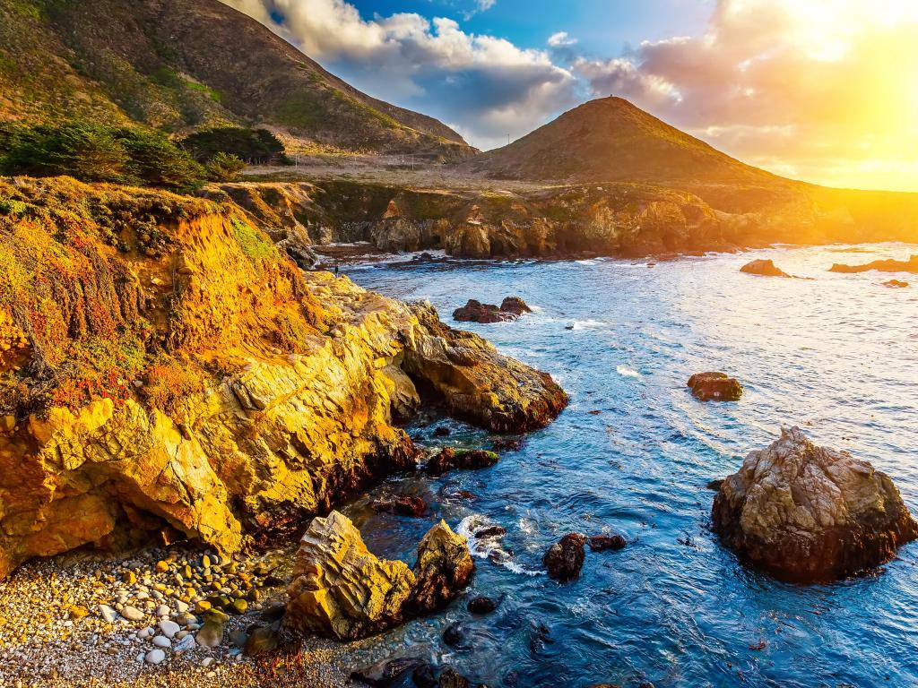 Pacific Ocean coast, California, USA taken at sunset with ragged cliffs.