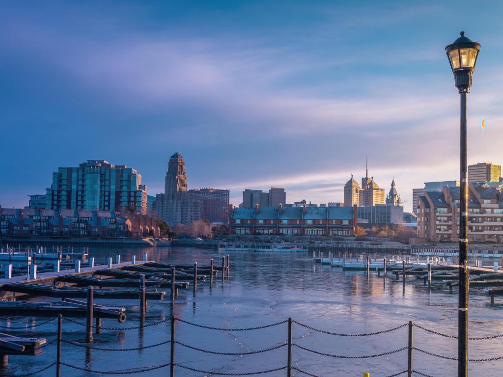 Buffalo, New York with the cityscape in the background and the marina in the foreground at early morning. 