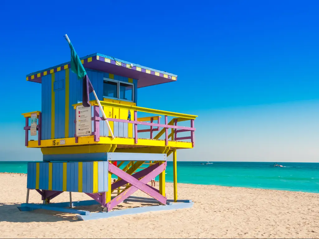 Colorful lifeguard tower on South Beach in Miami looking out to a perfectly clear sky and gorgeous sea