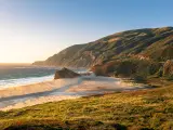 Big Sur river flowing out into the Pacific Ocean at Andrew Molera State Park south of Monterey, CA, Big Sur, California, USA.