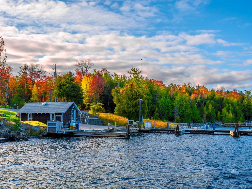 Beautiful autumn view of a dock and boathouse in Gills Rock Village