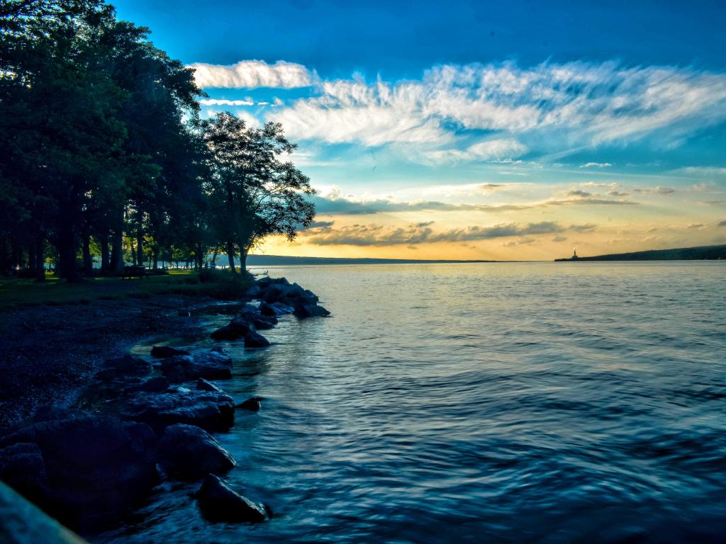 Cayuga Lake, Ithaca, New York, USA with a sunset on the lake. 
