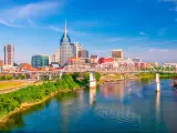 Nashville, Tennessee, USA downtown city skyline on the Cumberland River.