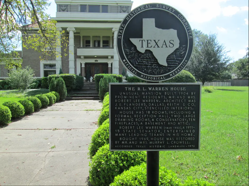 The 18-room mansion of R. L. Warren House and its historical medallion in Terrell, Texas.