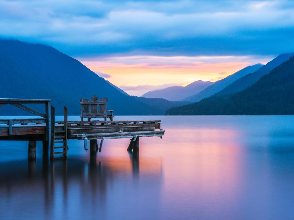 A jetty jutting out into Lake Crescent, Olympic National Park, WA at sunset in winter