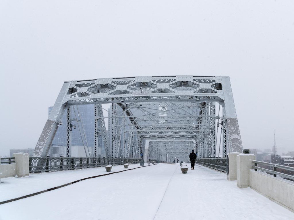 Nashville Skyline and Pedestrian Bridge during Snow Storm