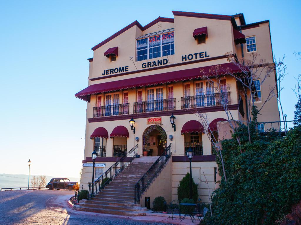 The facade of the hotel, which used to be a hospital, on a sunny day