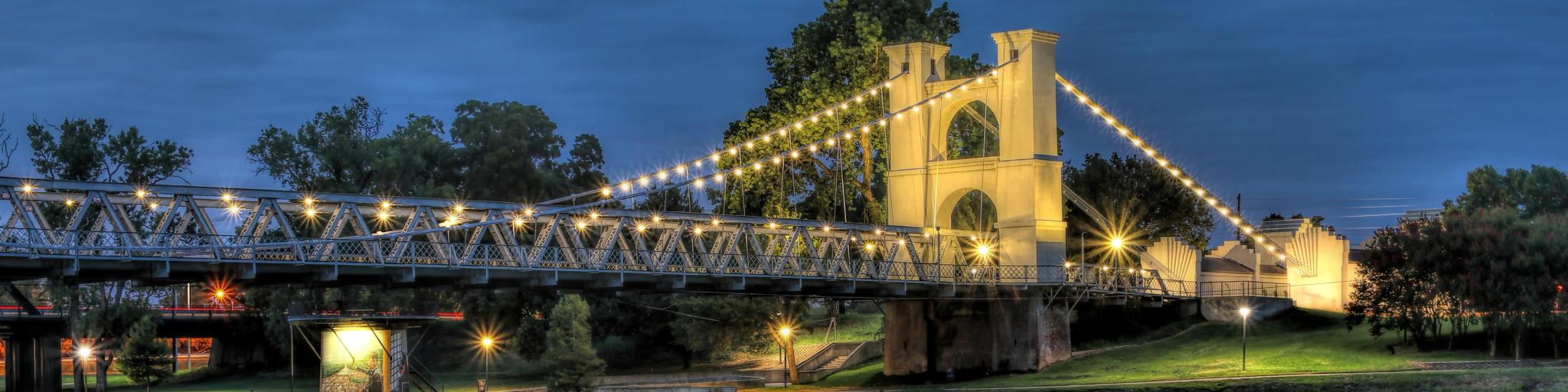 The historic Waco suspension bridge, built in 1870 and located in Indian spring park on the Brazos River.